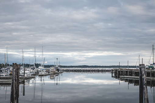 Clouds reflecting on the water at Blaine Harbor in Blaine, Washington.