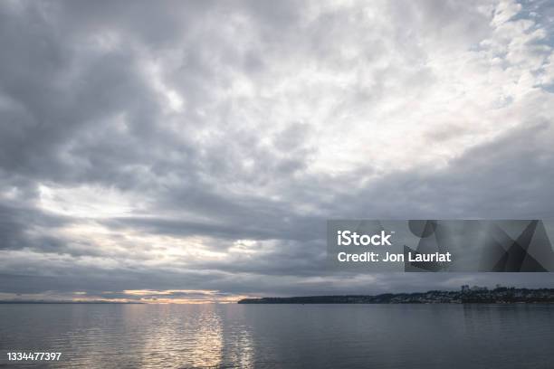 Photo Of Sunset Over White Rock Canada Across Semiahmoo Bay In Blaine Washington Stock Photo - Download Image Now
