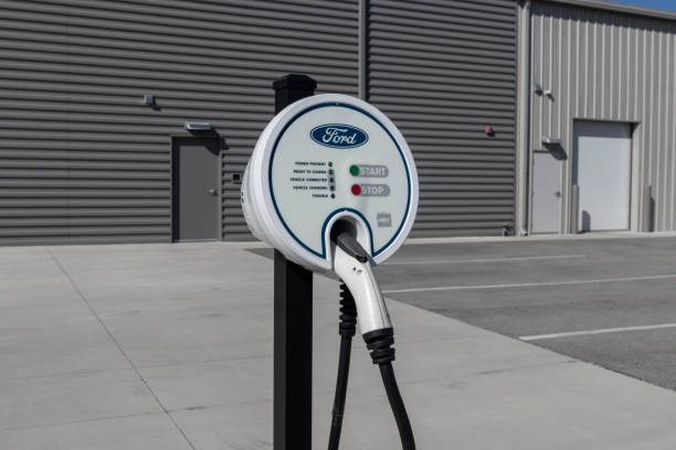 ford electric charging station for the mustang mach-e, fusion plug-in and the f-150 lightning. - domestic car color image horizontal car imagens e fotografias de stock