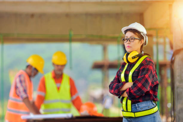 istock female inspectors and architects discuss 1334483763