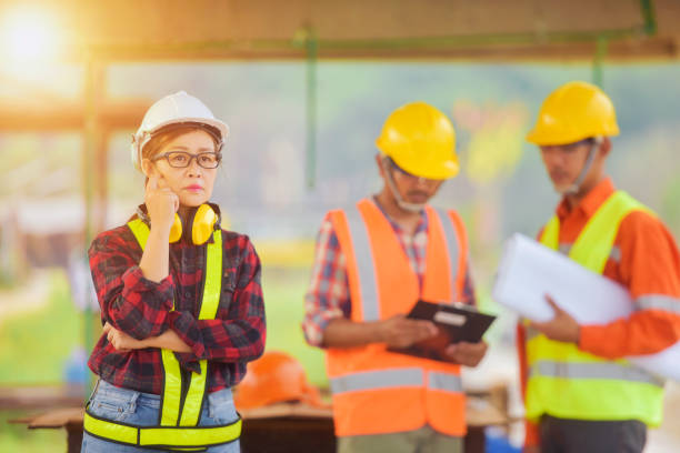istock female inspectors and architects discuss 1334483767