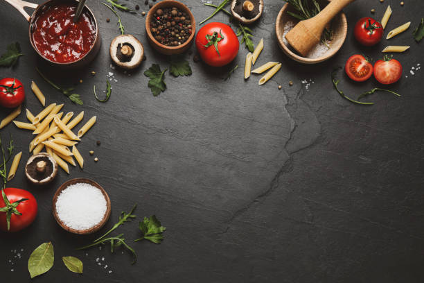 istock Flat lay composition with fresh products on black table, space for text. Healthy cooking 1334484936