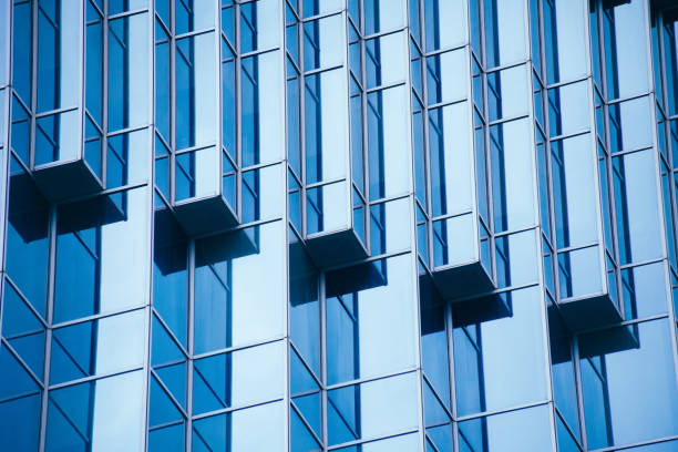istock Architecture details Modern Building Glass facade Business background 1334487604