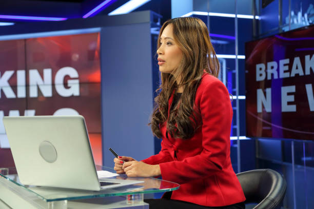 istock Female news anchor 1334488192