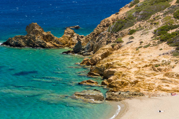 istock Quiet sandy beach next to a clear, warm ocean (Crete, Greece) 1334488401
