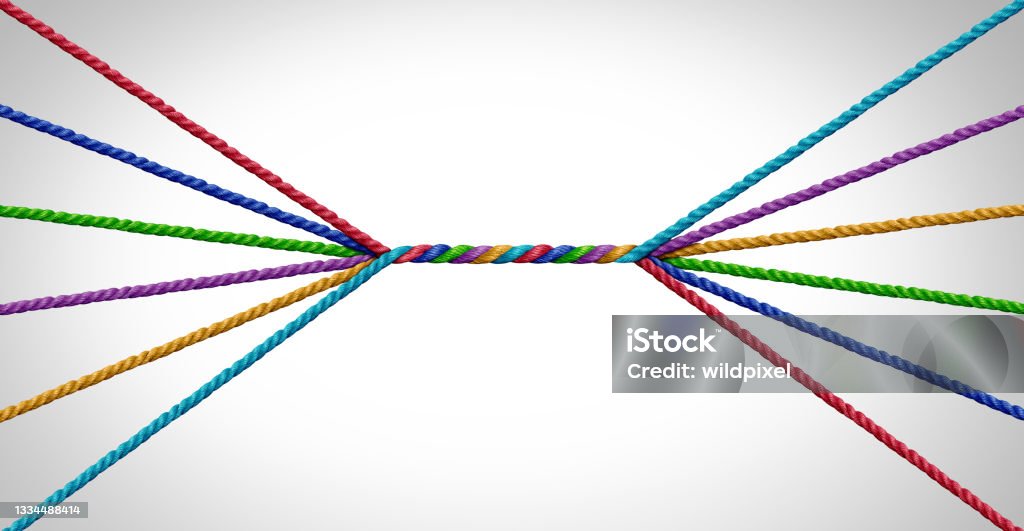 Connecting Together Connecting together and unity teamwork concept as a business metaphor for joining a partnership of diversity as diverse ropes connected together for a corporate symbol for cooperation and working collaboration. Togetherness Stock Photo