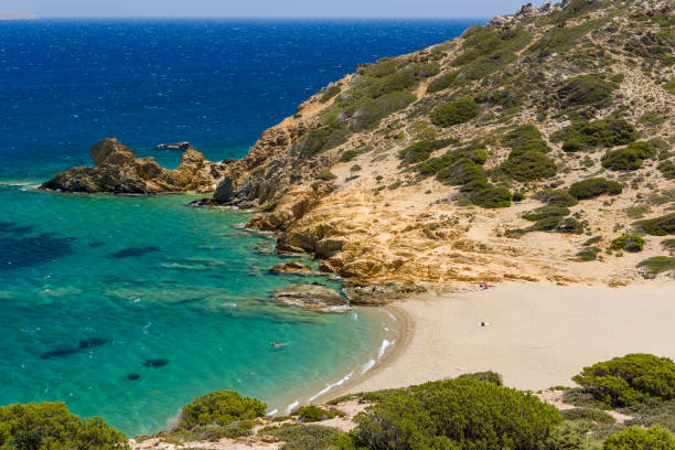 istock Quiet sandy beach next to a clear, warm ocean (Crete, Greece) 1334488446