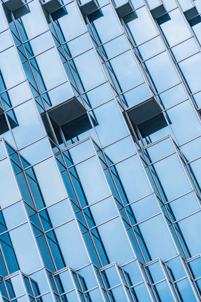 istock Architecture details Modern Building Glass facade Business background 1334488564