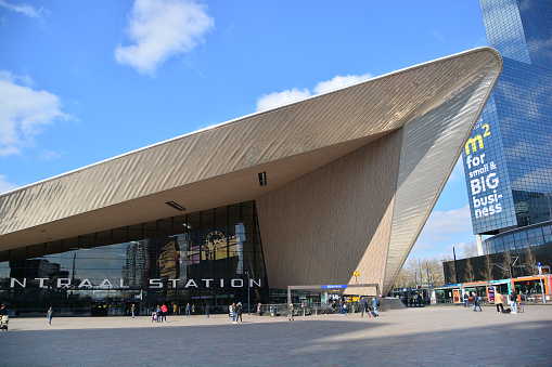 Rotterdam Central Station, The Netherlands - June 2021; Close up of the main entrance of the modern architectural structure of the railway station