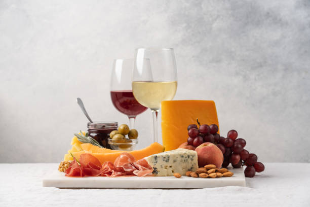 cheese platter - italian cuisine wine food pasta imagens e fotografias de stock
