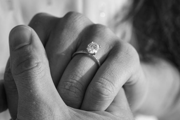 istock Engagement photo with diamond ring 1334496722
