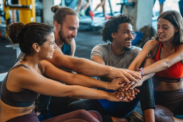 istock Beautiful fit people working out in gym together 1334496736