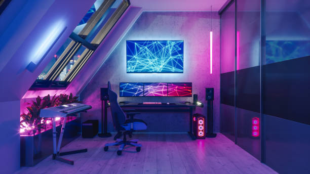 Gamer Room Interior of a gamer room lit with neon lights. video game stock pictures, royalty-free photos & images