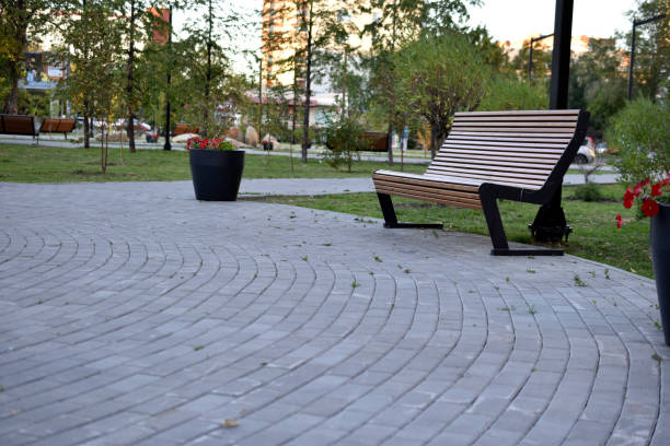 istock City park with garbage cans and flower beds 1334506358