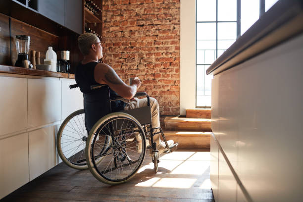 istock Modern Woman with Disability in Kitchen 1334507507