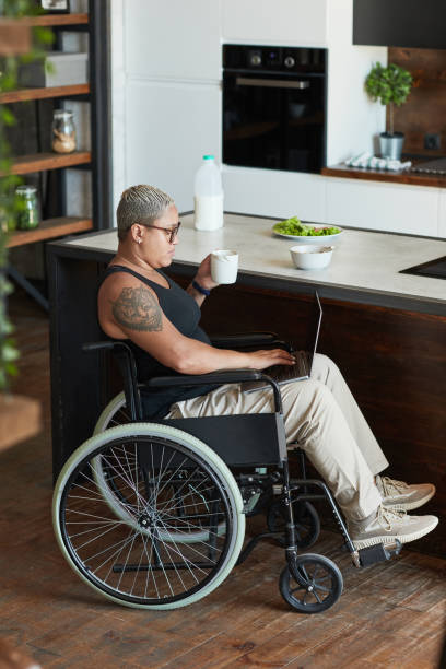 istock Modern Woman with Disability at Home 1334507528