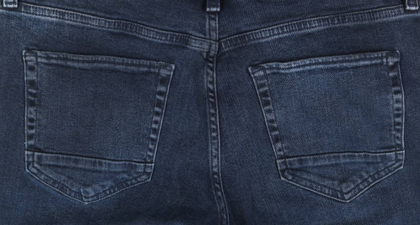 istock Close-up of dark blue jeans pockets. 1334510090