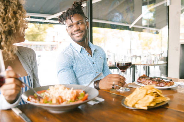 istock Young couple having a date at a restaurant. 1334511521