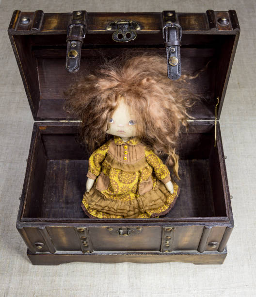 Close-up of a doll's clothes fitting