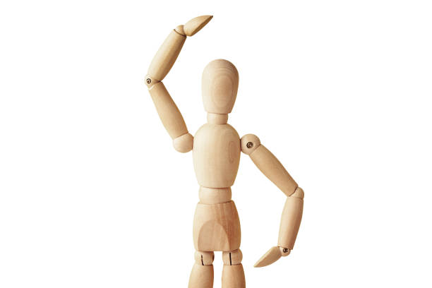 istock Wooden doll on white background isolated 1334515524