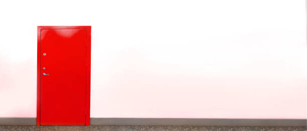 istock Closed red door on white wall 1334517702