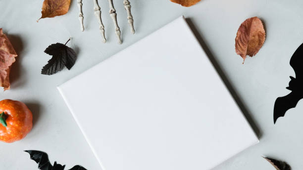 istock White canvas board and halloween decorations 1334520805