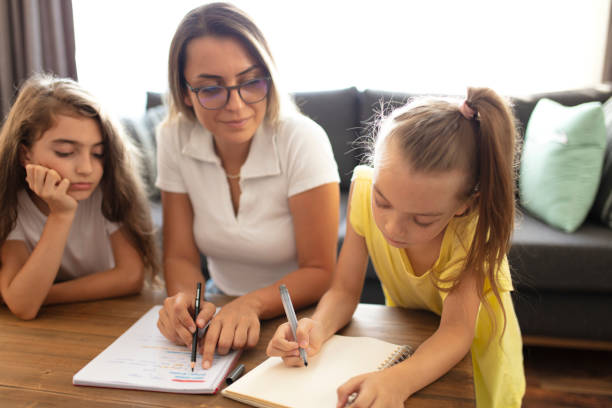istock teacher and student giving private lessons at home. homeschooling concept. 1334524019