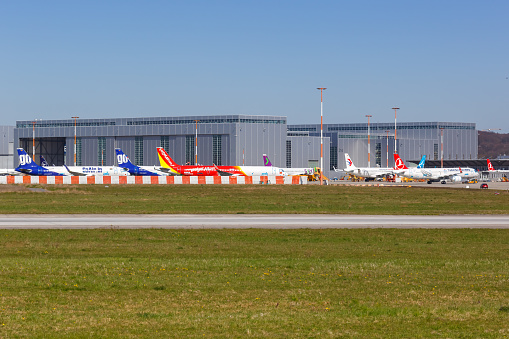 Hamburg, Germany - April 20, 2021: Airplanes at Airbus Hamburg Finkenwerder factory in Germany.