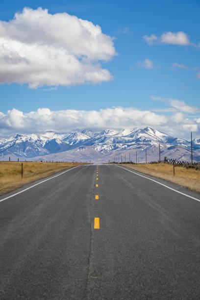 istock A long, straight road heading into the distant mountains 1334530875