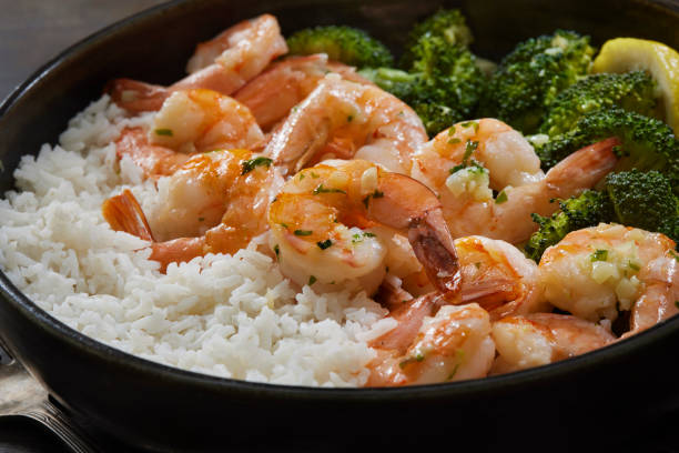 istock Shrimp and Rice Bowl with Steamed Broccoli 1334533711