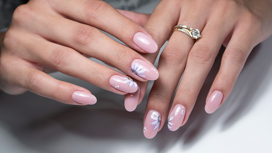 Hands With Manicure. Close Up Of Female Hands With Trendy Nails with decorations.