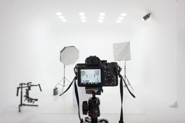 Photo studio setup with lights and camera. Photo studio setup with lights and camera. stage set design stock pictures, royalty-free photos & images