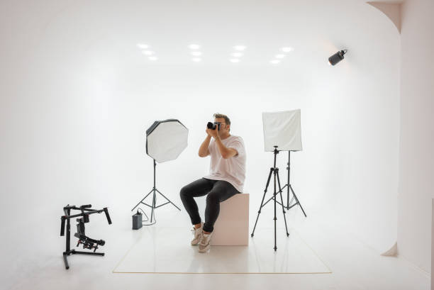 istock A photographer works in studio 1334541293