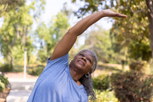 istock Senior black woman stretching 1334541417
