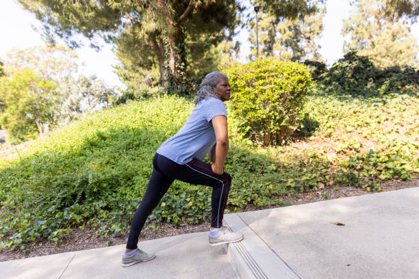 istock Senior black woman stretching 1334541524