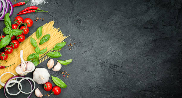 istock cherry tomatoes, pasta, basil, garlic, onion, chili and peppercorns 1334543108