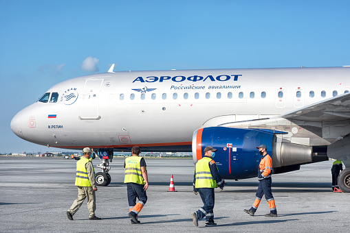 Abakan, Russia - August 08, 2020: serving and getting ready of the aircraft at the airport in summer.