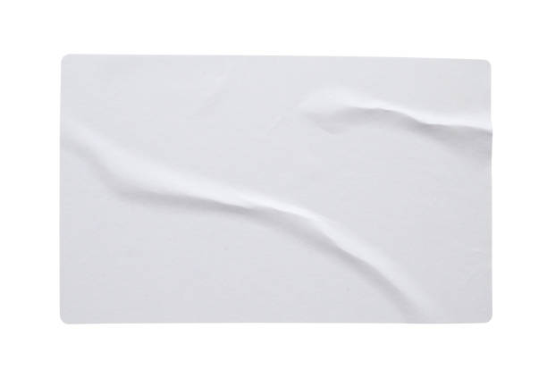istock Blank paper sticker label texture isolated on white background 1334547614