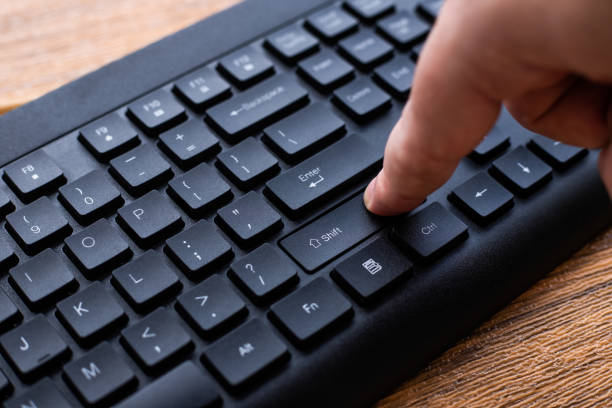 istock Hands Pointing Pressing Computer Keyboard Keys Typewriting New Ideas. Fingers Tapping Typing Fresh Thoughts Using Wireless Notebook Keypad. 1334548365
