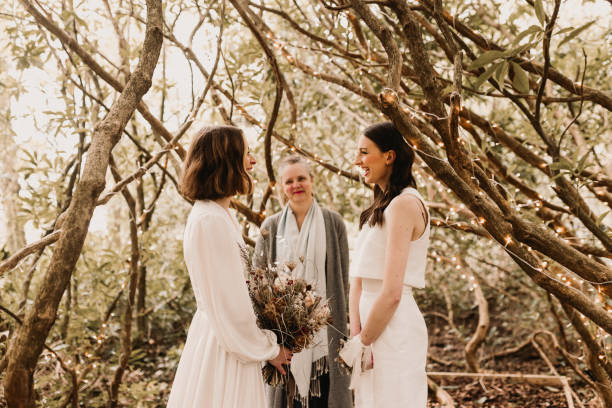 Same sex elopement wedding Lesbian couple elope in Wales UK with a humanist celebrant wedding ceremony stock pictures, royalty-free photos & images