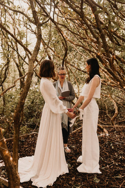 Same sex elopement wedding Lesbian couple elope in Wales UK with a humanist celebrant eloping stock pictures, royalty-free photos & images