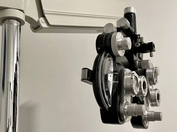 istock Ophthalmologic phoropter or refractor in examination room - stock photo 1334551347