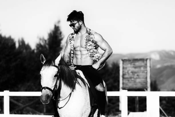 istock Man Riding a Horse on Beautiful Sunny Day 1334551414
