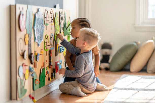 istock Nursery school friends learning togethehr 1334556374
