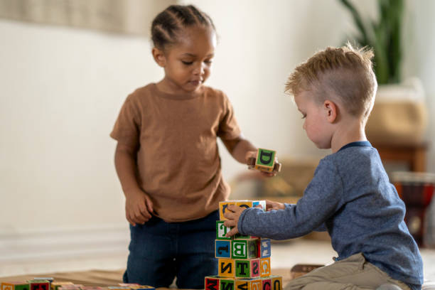 istock Preschool boys playing together at daycare 1334556379