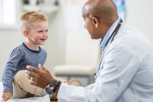 istock Young boy at a medical check up appointment 1334556648