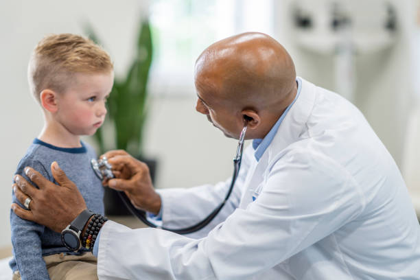 istock Doctor using a stethoscope on a young child patient 1334556649
