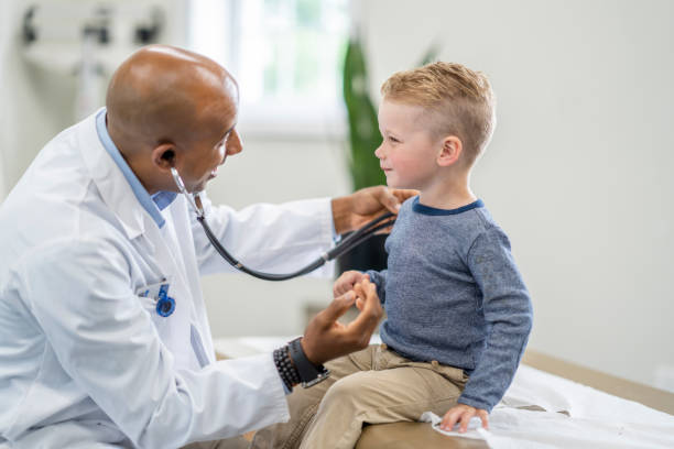 istock Four year old boy at a medical check up 1334556656