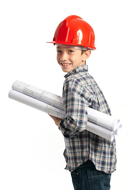 child with red helmet and sketches stock photo