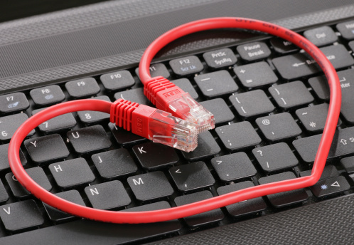 computer laptop keyboard and heart cable